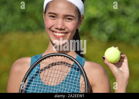 Felice ragazza tennista atleta femminile Foto Stock