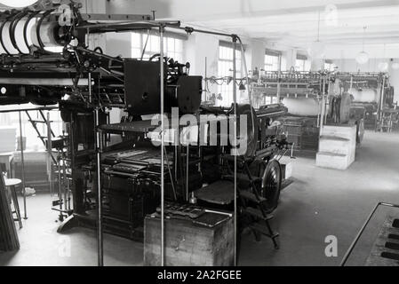 Rotationsdruckmaschinen in den Werken des Maschinenbaukonzerns MAN (Maschinenfabrik Augsburg-Nürnberg), Deutschland 1930er Jahre. Rotative negli impianti di ingegneria meccanica azienda MAN (Maschinenfabrik Augsburg-Nürnberg), Germania 1930s. Foto Stock