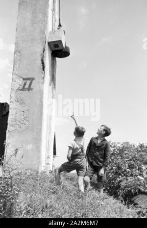 Ein mit Gas Haushalt befeuerter, Deutsches Reich 1930er Jahre. A gas per uso domestico illuminato, Germania 1930s. Foto Stock