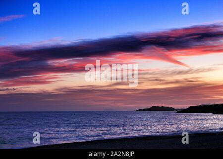 Bel Tramonto sulla spiaggia di Isla Plana, Cartagena, Murcia, Spagna. Foto Stock