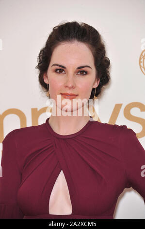 LOS ANGELES, CA. 18 settembre 2011: Cavendish Abbey star Michelle Dockery arrivando al 2011 Primetime Emmy Awards presso il Nokia Theatre di Los Angeles Vivere nel centro di Los Angeles. © 2011 Paul Smith / Featureflash Foto Stock