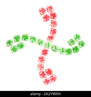 Hard Candy in forma di lauburu, basco croce, disposte nella stessa forma, isolati su sfondo bianco Foto Stock