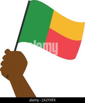 Mano azienda e innalzare la bandiera nazionale del Benin Illustrazione Vettoriale