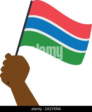 Mano azienda e innalzare la bandiera nazionale del Gambia Illustrazione Vettoriale