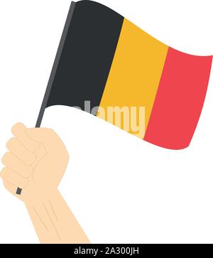 Mano azienda e innalzare la bandiera nazionale del Belgio Illustrazione Vettoriale