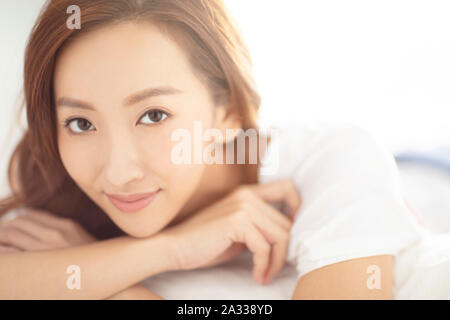 Closeup giovani asiatici donna sorridente volto Foto Stock