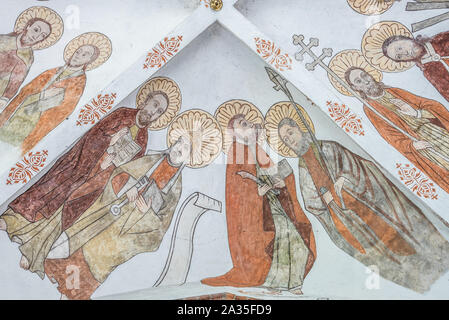 Il murale dei quattro apostoli con i loro simboli, una parete-pittura da circa l'anno 1500 nella chiesa di Santa Maria, Elsinore, Danimarca, 14 maggio 2019 Foto Stock