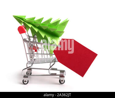 Vendite di Natale concetto con albero in carrello Foto Stock