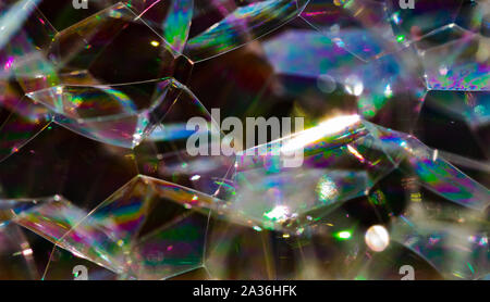 La illuminano rainbow sulla superficie della bolla Foto Stock