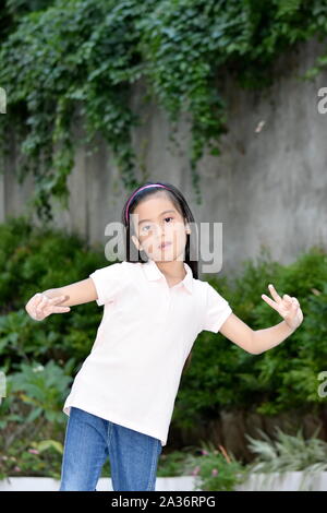 Una Gioventù divertendosi Foto Stock