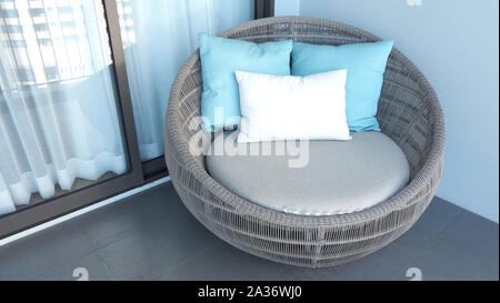 Outdoor sedia spiaggia sul balcone della camera o terrazza che fece di legno naturale chiamato rattan e colore marrone forma rotonda e cercare di lusso per ri Foto Stock