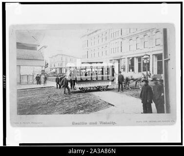 Seattle è la prima strada auto passando dalla Occidental Avenue a modo Yesler] / Theo. E. Peiser, fotografo Foto Stock