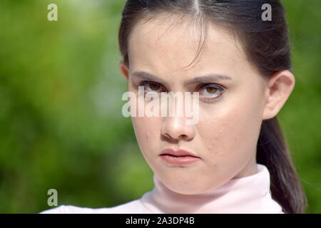 Un testardo donna femmina Foto Stock