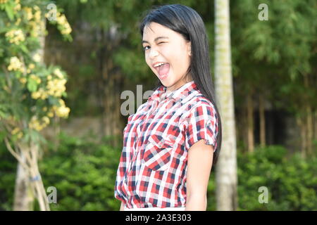 Un occhiolino ragazza di minoranza Foto Stock