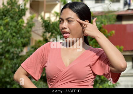 Un pazzo Filipina giovanile persona Foto Stock