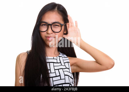 Giovani asiatici nerd adolescente ragazza ascoltando con attenzione Foto Stock