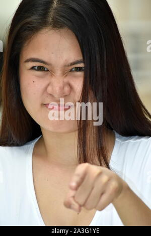 Una femmina e la rabbia Foto Stock