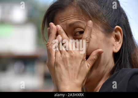 Un temibile vecchi Senior femmina Foto Stock