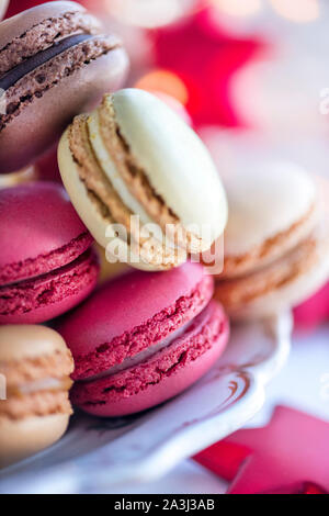 Stagione Natale macarons messa a fuoco selettiva testo macro su lay Foto Stock