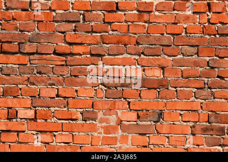 Grunge muro di mattoni con uno sfondo con texture sporca Foto Stock