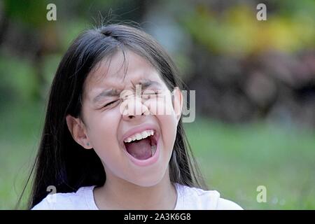 Un Startled Girl bambino Foto Stock