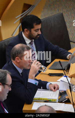 Edinburgh, Regno Unito. Il 9 ottobre 2019. Nella foto: (alto-basso) Humza Yousaf MSP - Armadio Segretario alla giustizia; Michael Matheson MSP - Armadio Segretario per i trasporti, le infrastrutture e la connettività; Paolo timoneria MSP - il ministro dell'energia. Credito: Colin Fisher/Alamy Live News Foto Stock