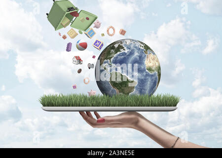 Donna di mano azienda tablet con erba e piccolo pianeta Terra sullo schermo e cestino nell'aria fuori di dumping diversi oggetti in giù sulla terra. Foto Stock