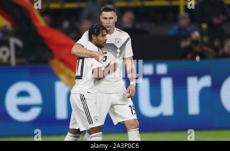 Dortmund, Germania. 09oct, 2019. firo: 09.10.2019 Calcio, 2019/2020 Landerspiel: National Team Germany - Argentina obiettivo di giubilo 1: 0 di Serge Gnabry con Niklas Sule | Utilizzo di credito in tutto il mondo: dpa/Alamy Live News Foto Stock