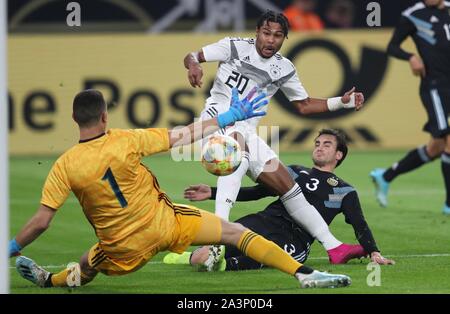 Dortmund, Germania. 09oct, 2019. firo: 09.10.2019 Calcio, 2019/2020 Landerspiel: National Team Germany - Argentina obiettivo di renderlo 1-0 da Serge Snabry portiere Agustín Marchesin e Nicolás Tagliafico | Utilizzo di credito in tutto il mondo: dpa/Alamy Live News Foto Stock