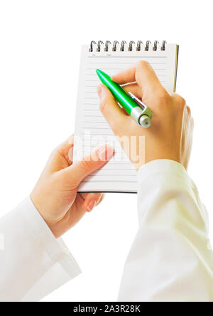 Giovani dolce medico scrive qualcosa Foto Stock