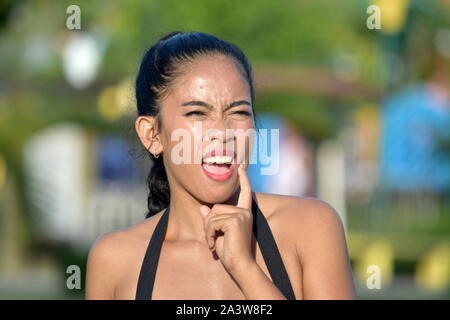 Femmina con il mal di denti Foto Stock