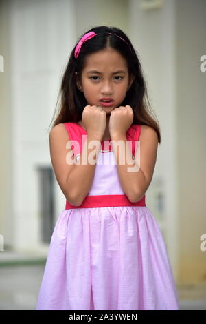 Abbastanza varia la ragazza e la rabbia Foto Stock