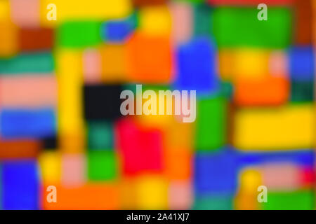 Colorato sfondo astratto con molti colori positivo. Multicolor forme geometriche in blur. Uno sfondo sfocato. Foto Stock