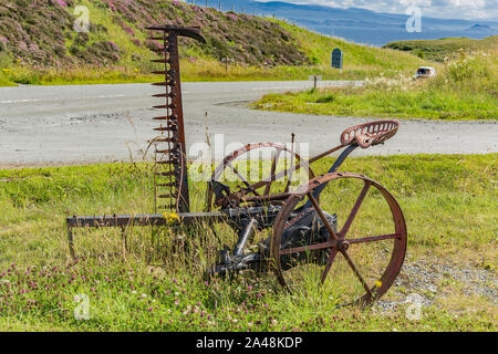 Antique McCormick Horse-Drawn tosaerba di fieno, Ellishadder, Isola di Skye Foto Stock