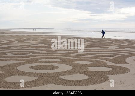 Arte di sabbia da sabbie mobili e i cerchi nella sabbia artisti, sulla spiaggia Heceta a Firenze, Oregon, Stati Uniti d'America. Foto Stock