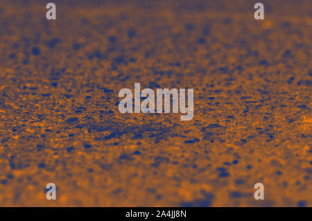 Blu Arancione base, macchie di colore arancione su sfondo blu, digital riempimento texture Foto Stock