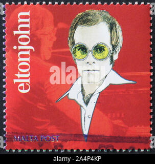 Disegno di Elton John sul francobollo Foto Stock