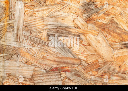 Vicino la foto di un di legno oriented strand board o OSB. Scheda Sterling texture di sfondo Foto Stock