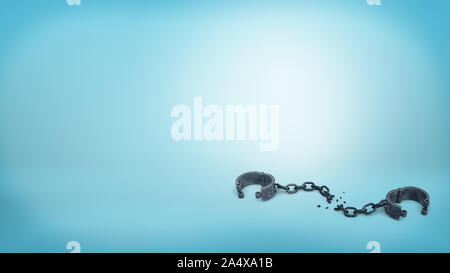 3D rendering di set di ferro nero manette su una catena spezzata giacente aperta su uno sfondo blu. Foto Stock