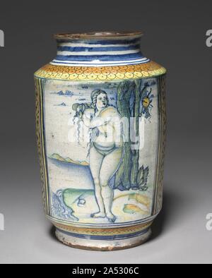 Storage cilindrico Jar: Venere sulla riva del mare, c. 1507-1510. La scena rappresentata su questa nave, la dea Venere che emergono dal mare e la sua asciugatura Capelli, si basa su una incisione di Marcantonio Raimondi datata 11 /Settembre 1506. Alfred Pringsheim era un ebreo tedesco collector. Durante la Kristallnacht, nel novembre 1938, il SS Pringsheim sequestrata la collezione di maioliche dalla sua casa di Monaco di Baviera. Essa è stata conservata in allegato al Bayerishches Museo Nazionale di Monaco di Baviera. Nel marzo 1939, il Ministero tedesco del commercio di esportazione autorizzata di Pringsheim la collezione di maioliche a Londra per asta di Sotheby's, Foto Stock