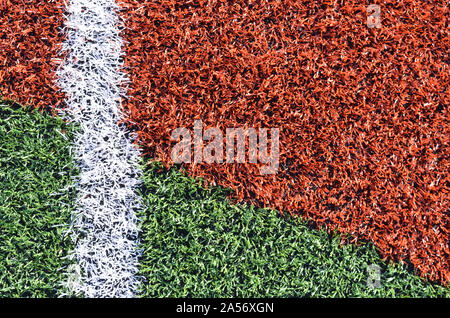 Campo da gioco turf in angoli diversi e con diversi colori e linee. Foto Stock