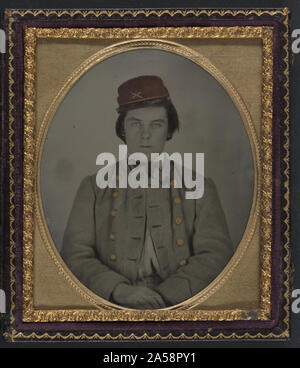 L'artiglieria non identificato soldato confederato in uniforme e kepi hat Foto Stock