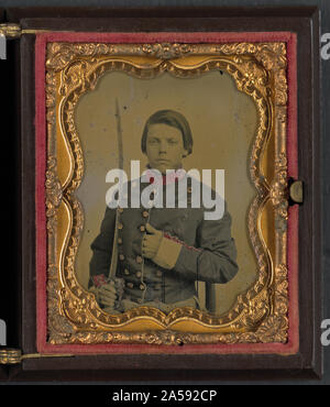 Unidentified giovane soldato confederato in uniforme con sciabola Foto Stock