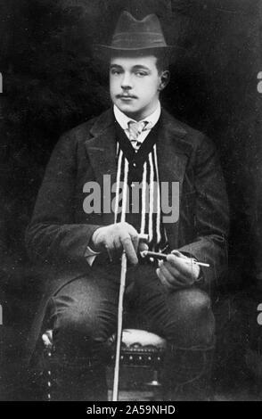 Re Manuel seduto con la canna da zucchero Foto Stock