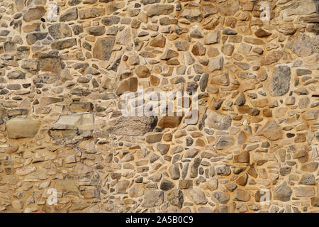 Antico muro fotografato a Cipro. Primo piano di un marrone chiaro tile parete. Molto unico vecchio e tradizionale parete a spiovente. Bella la texture. Foto Stock