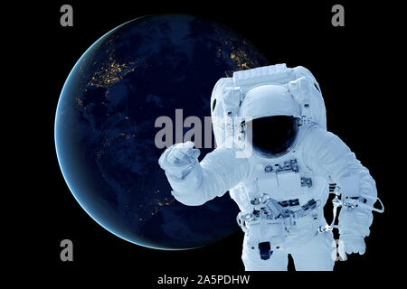 Astronauta al di sopra del pianeta Terra. Gli elementi di questa immagine sono state arredate dalla NASA. Foto Stock