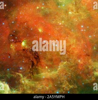 Questo paesaggio di vorticazione di stelle è noto come il Nord America nebulosa. Spitzer. Foto Stock