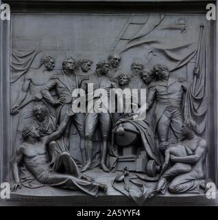 Dettaglio in rilievo da Nelson colonna del monumento in Trafalgar Square nel centro di Londra Foto Stock