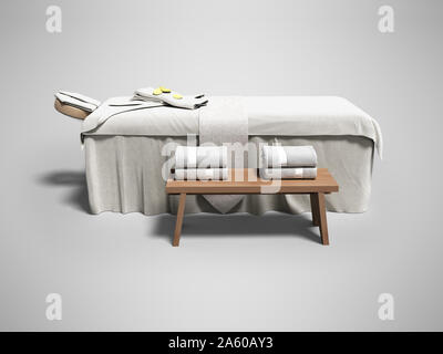 Bianco moderno letto da massaggio con asciugamani ripiegati 3D render su uno sfondo grigio con ombra Foto Stock