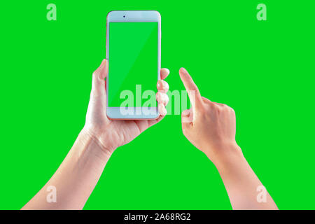 Smart phone attesa da una donna su un schermo verde Foto Stock